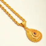 QKATIKA GOLD PLATED DESIGNER MATA PENDANT WITH CHAIN