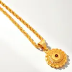 QKATIKA GOLD PLATED ROUND DESIGNER PENDANT WITH CHAIN
